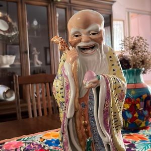 Ceramic Asian Figurine with wooden stand